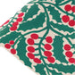green and red Christmas holly wrapping paper